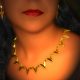 22k gold necklace presented in plain geometric lines