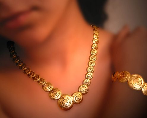 18k gold creation with repeated spiral motifs inspired from the Cycladic and Minoan civilazation