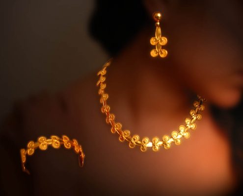 22k gold creation of repeated motifs inspired from the ancient greek period