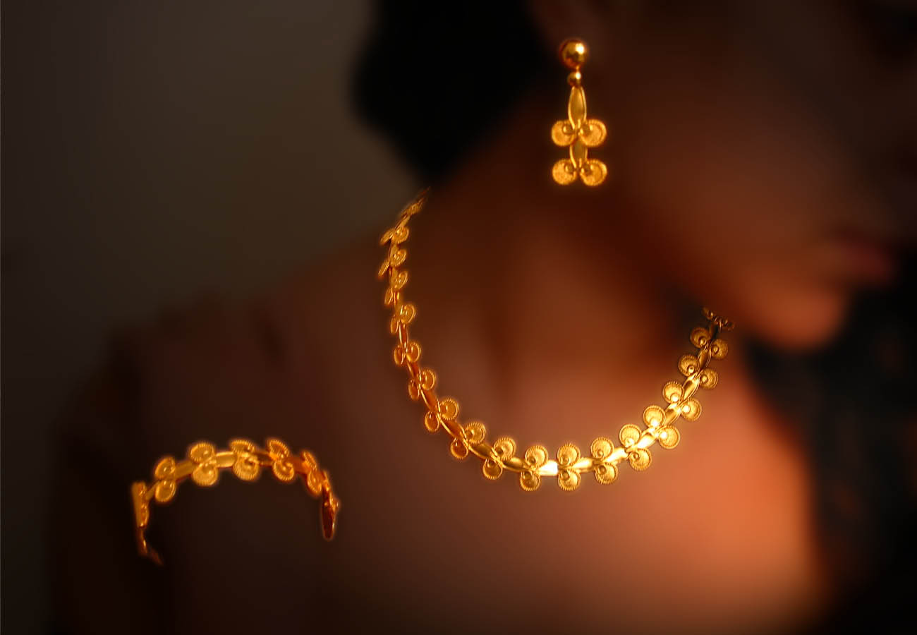 22k gold creation of repeated motifs inspired from the ancient greek period