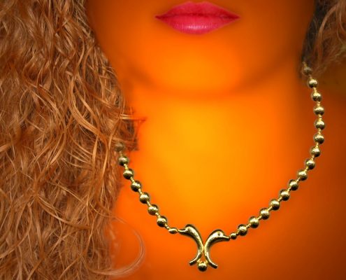 22k gold necklace inspired by the Minoan period rich wall decorations with marine life themes