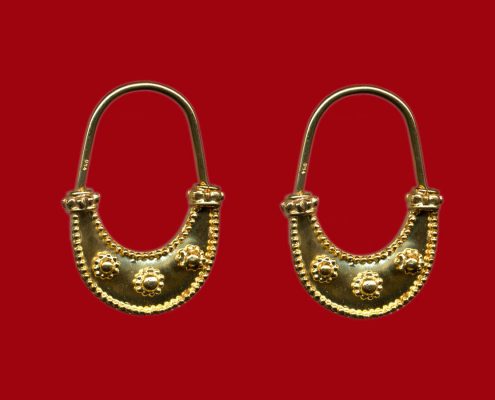 Boat-shaped earrings with granulated circles, late 6th century BC