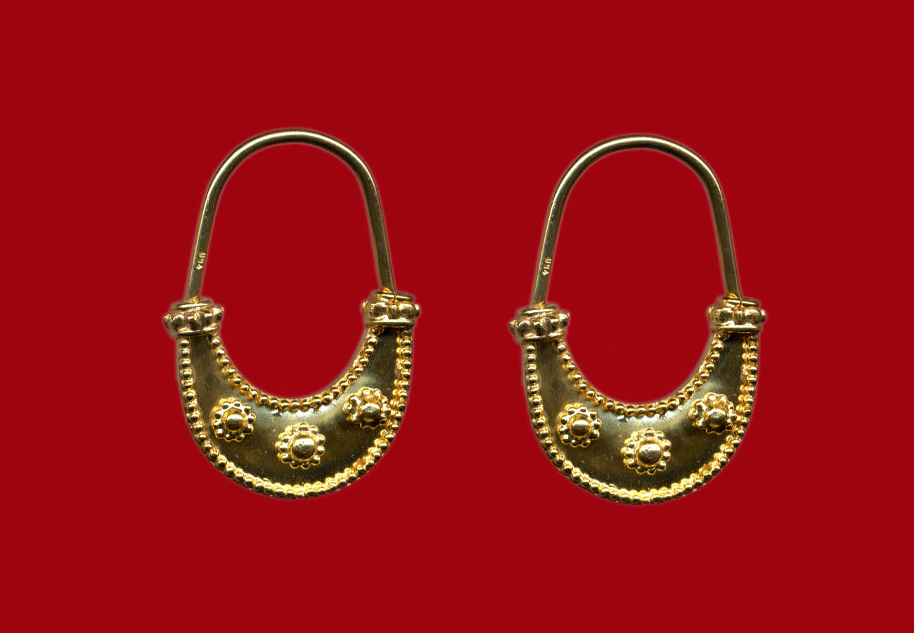 Boat-shaped earrings with granulated circles, late 6th century BC