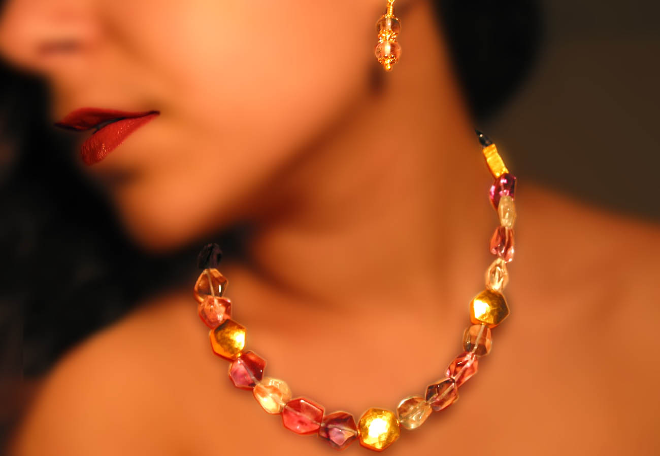 Creation in 22k gold with semi-precious stones