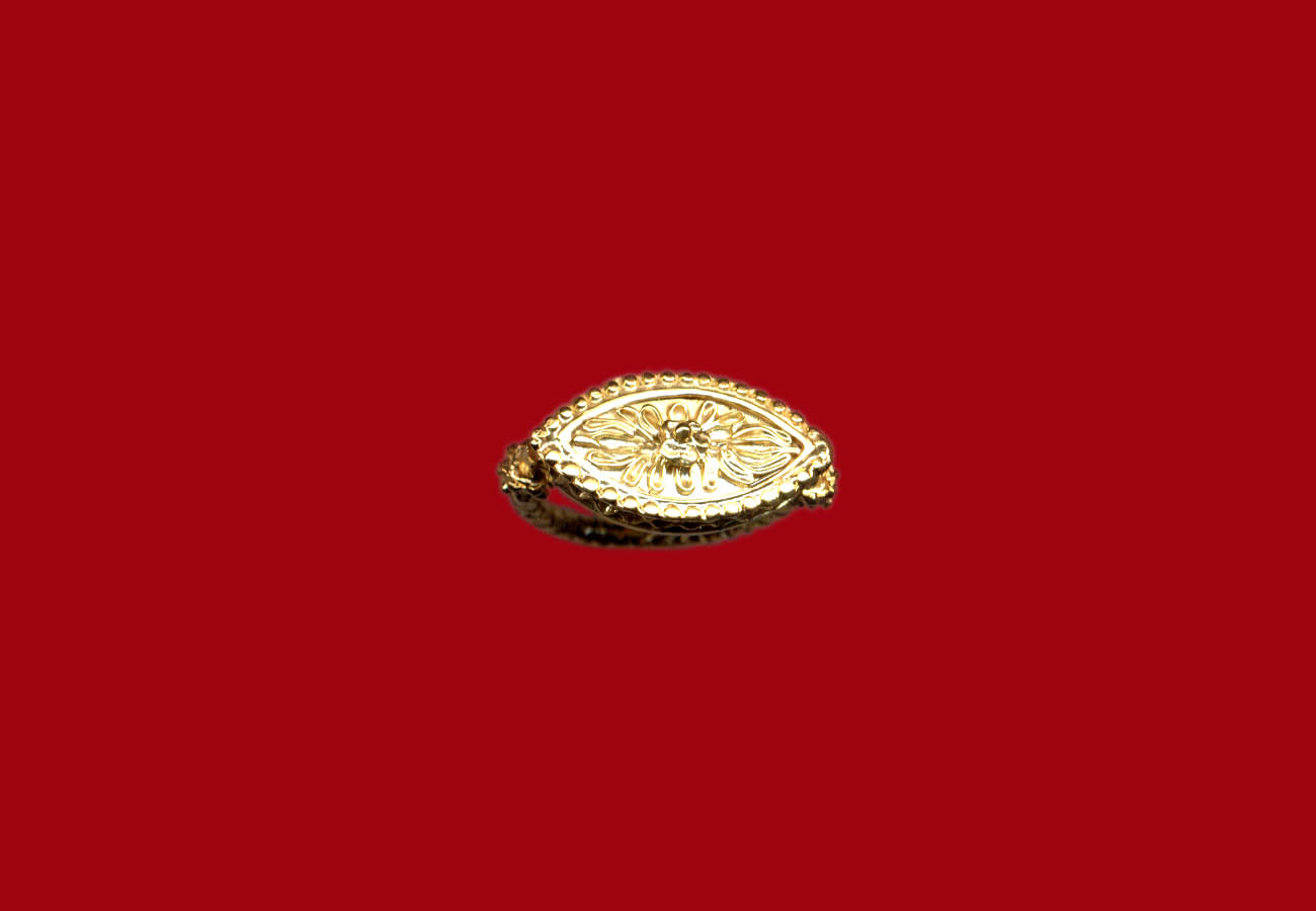 Gold finger ring with bifacial palmette bezel late 5th century BC