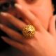 Ring in 22k gold decorated with precious stone